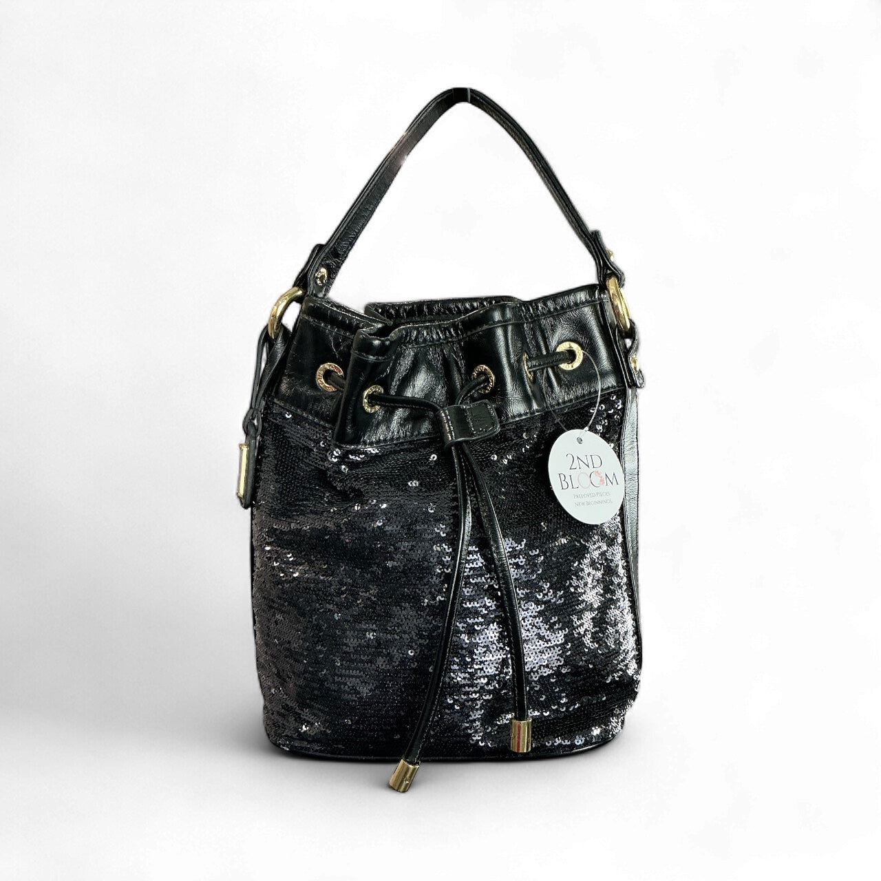 Bolso Coach Poppy Cinch – Lentejuelas negras con forro fucsia